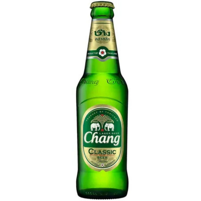 Chang Classic Beer product shot. Green bottle with a green oval label that depicts 2 elephants. Photographed on a white background.