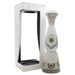 A ceramic tequila decanter from Clase Azul Tequila & Aromas, standing next to its white cardboard presentation box on a clean white background.
